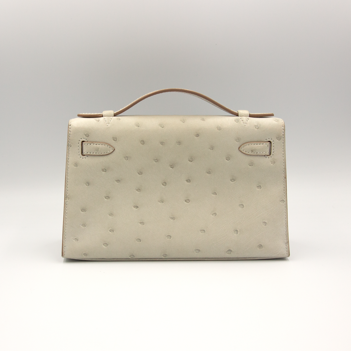 Hermes 2023 Kelly Mini Pochette Gris Perle Ostrich with Palladium Hardware