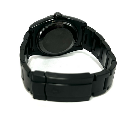 Rolex Oyster Perpetual Titan Black 124200